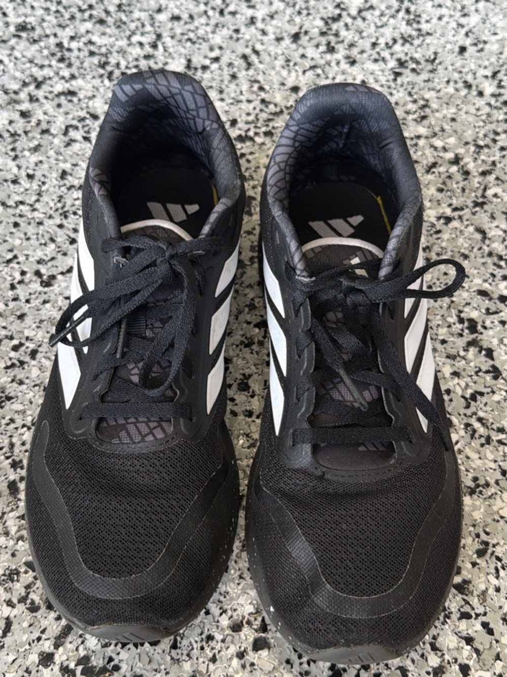 adidas Men’s Black Athletic Shoes with White Stripes
